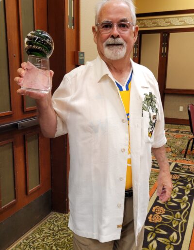 Dan Displaying His Leader Award