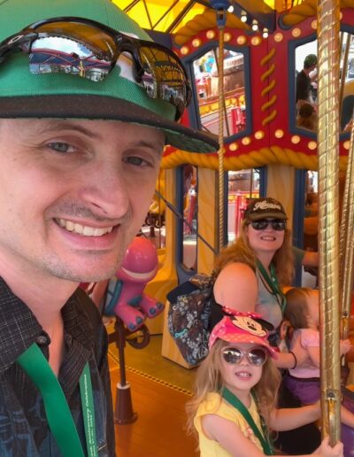 Ross and His Family at the Carousel