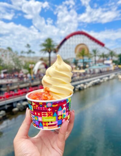 Woman's Hand Holding Disney Ice Cream