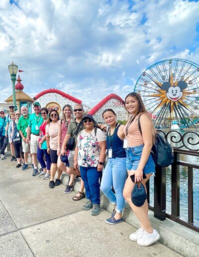 Thompson Tax Team with Disney Park in the Background